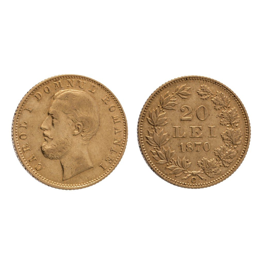 Obiecte din arhiva fostului prim-ministru Petru Groza și o sabie ca pe Columna lui Traian, în Licitațiile de Istorie de la Artmark! 2 moneda 20 lei Carol I