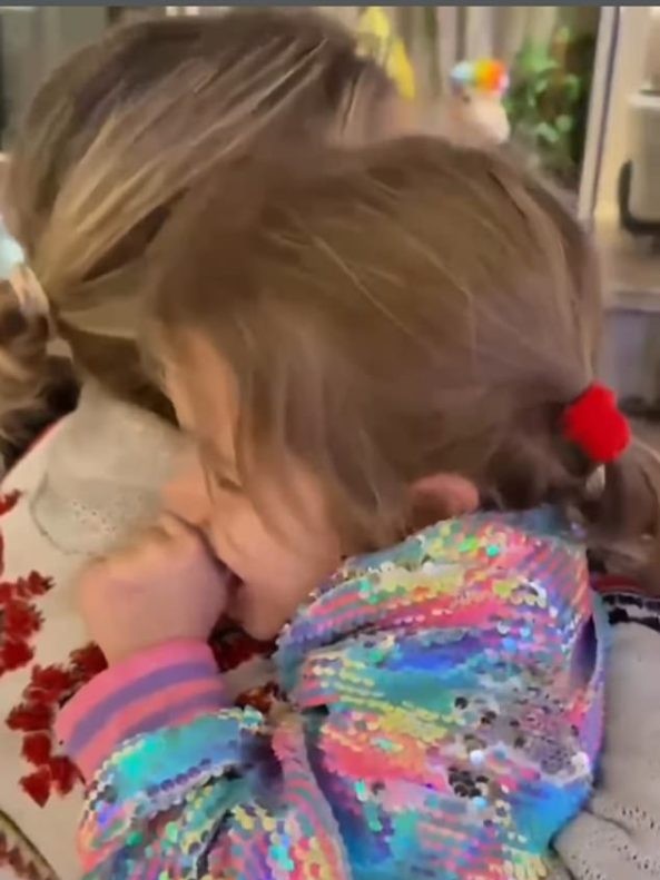 She was delighted to be reunited with her tots