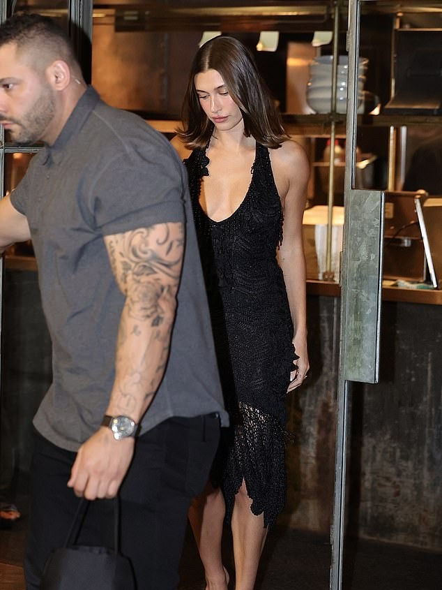 The model and entrepreneur failed to raise a smile as she left Justin Hemmes's popular Chinese restaurant, Mr Wong