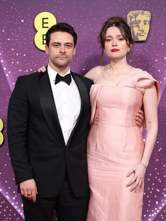 The White Lotus star, 32, looked sensational in a perfectly tailored pink floral gown which featured a boned corset and Grecian inspired straps