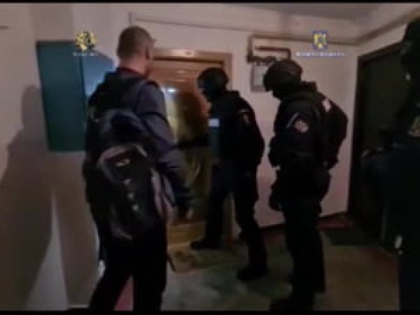 migranți